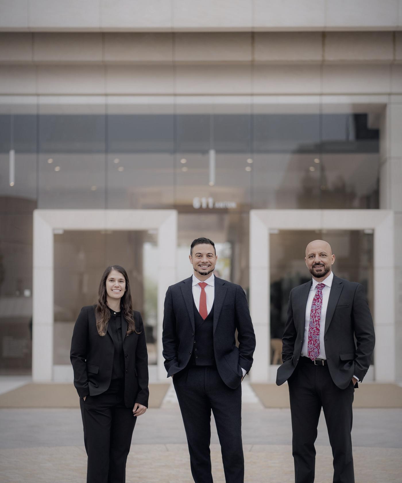 Lisa Noveck, Jonathan LaCour and Rony Barsoum outside the firm's offices